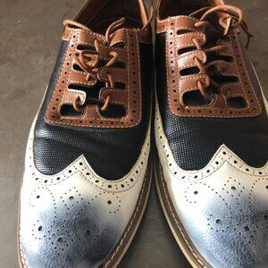 Leather and vinyl dress shoes. Worn once, great condition. size 10.5